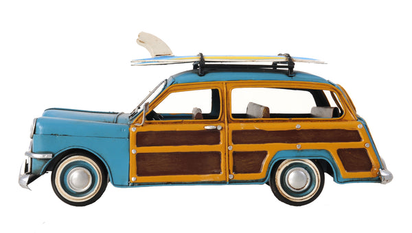 1949 Blue Ford Wagon Car with Two Surfboards