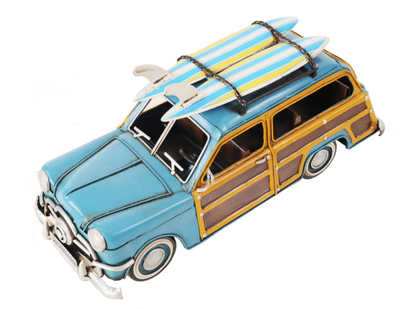 1949 Blue Ford Wagon Car with Two Surfboards