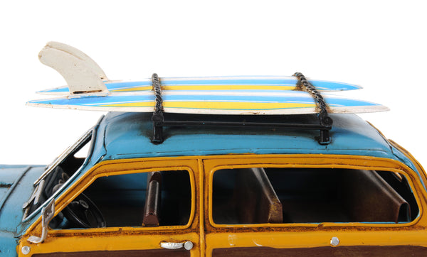 1949 Blue Ford Wagon Car with Two Surfboards