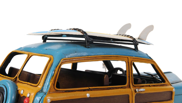 1949 Blue Ford Wagon Car with Two Surfboards